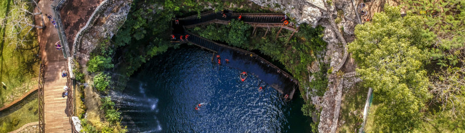 Drone photograph of cenote in Cancún, Mexico
